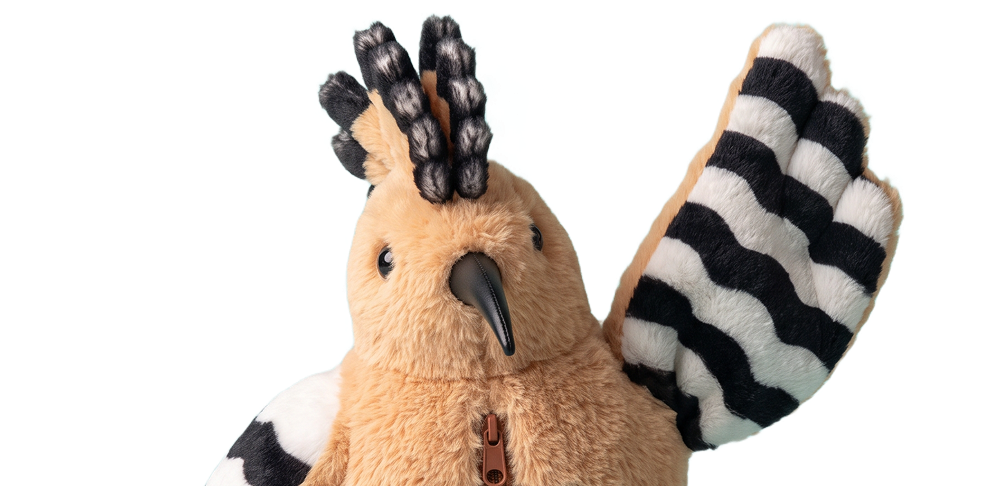 Honor the hoopoe-bird toy waving