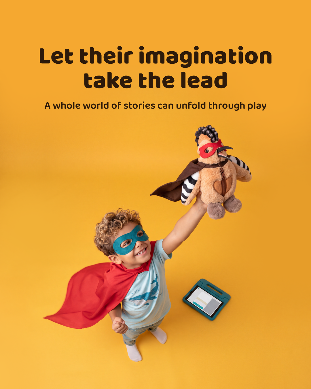 A child dressed as a hero holding Honor up high, with the words “Let their imagination take the lead”